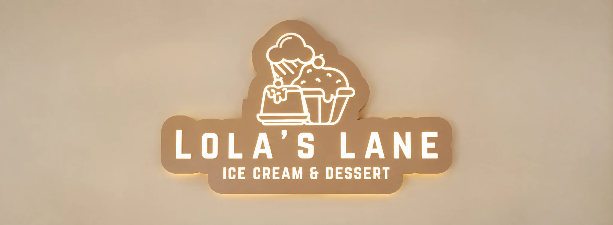 Lola’s Lane brings gelato, freshly baked cookies, brownies and specialty coffee together under one bright yellow identity in Azizi Riviera.